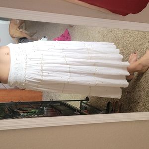 white boho maxi skirt with gold accents